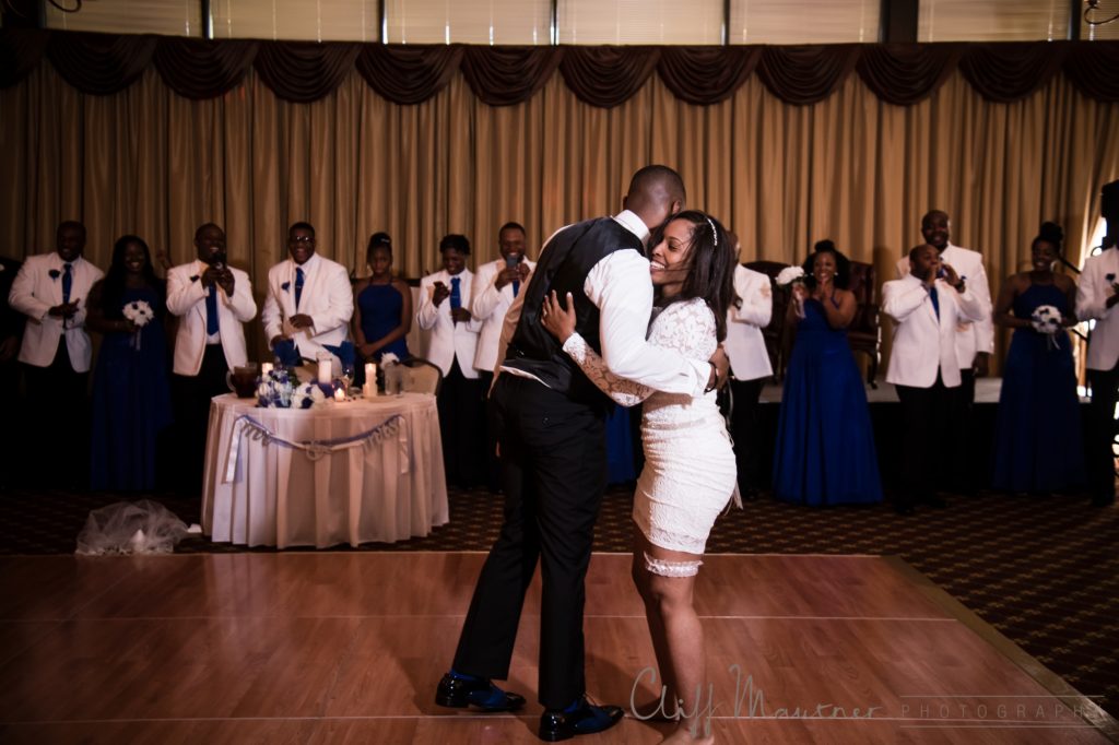 The couple embraces after their first dance. 